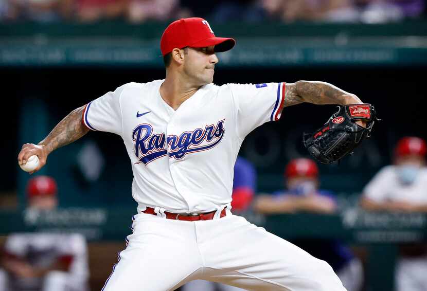 Texas Rangers relief pitcher Matt Bush (51) throws against the Toronto Blue Jays during...