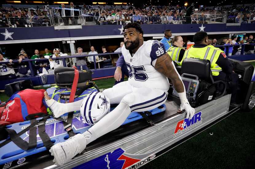 Dallas Cowboys defensive tackle Johnathan Hankins (95) was carted off the field during the...