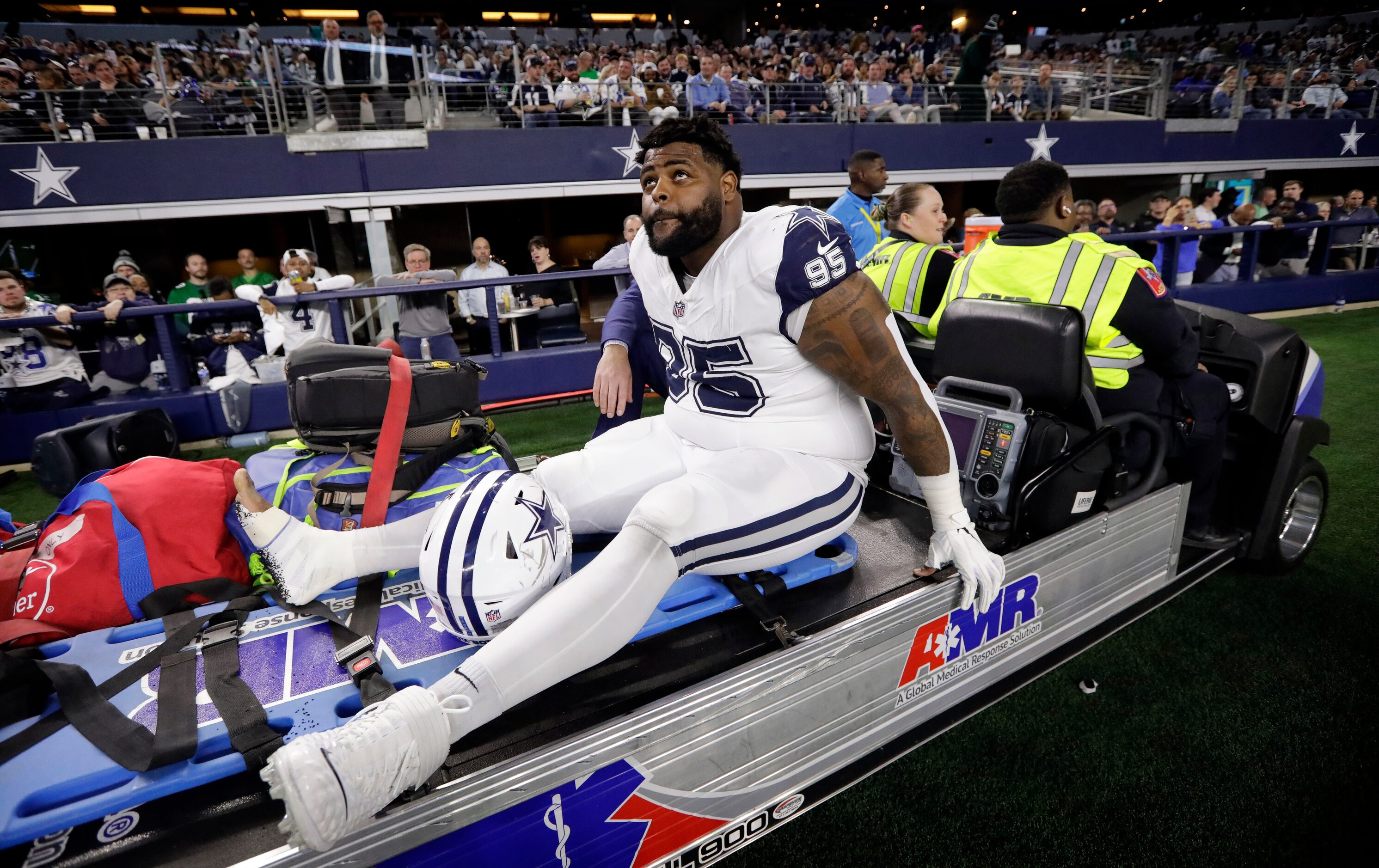 Dallas Cowboys defensive tackle Johnathan Hankins (95) was carted off the field during the...