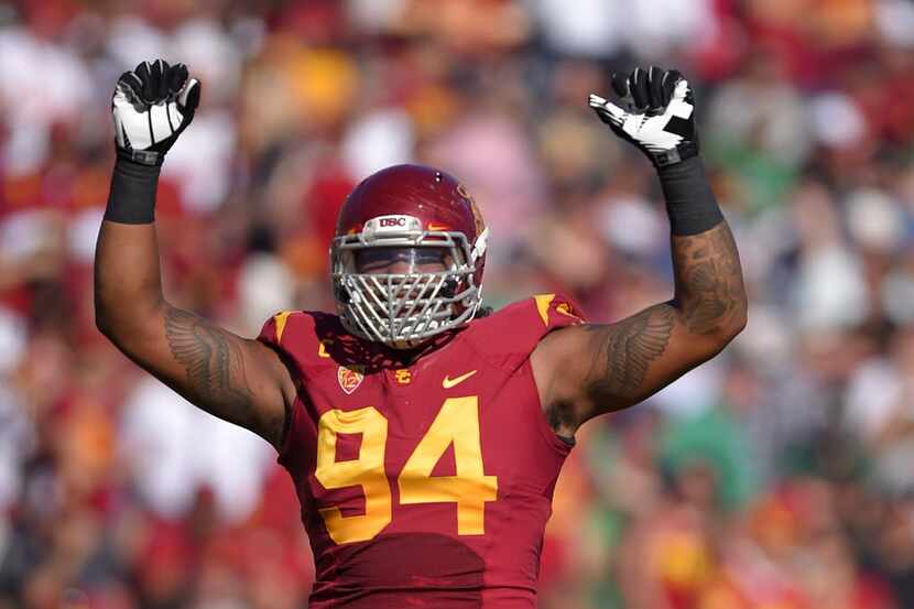 In this Nov. 29, 2014, file photo, Southern California defensive end Leonard Williams...