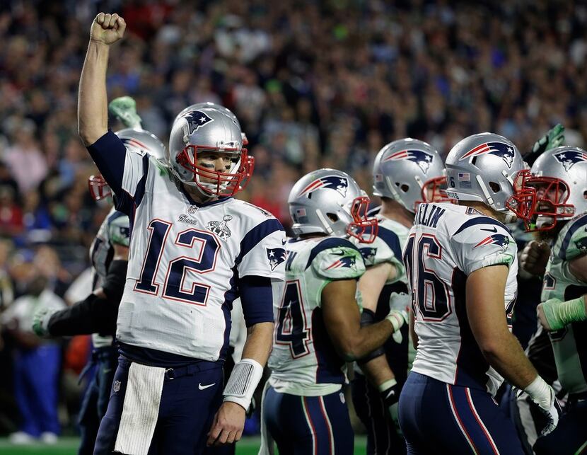 FILE - In this Feb. 1, 2015, file photo, New England Patriots quarterback Tom Brady (12)...