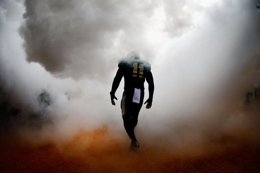 Taylor Young #11 of the Baylor Bears walks on the field before taking on the TCU Horned...
