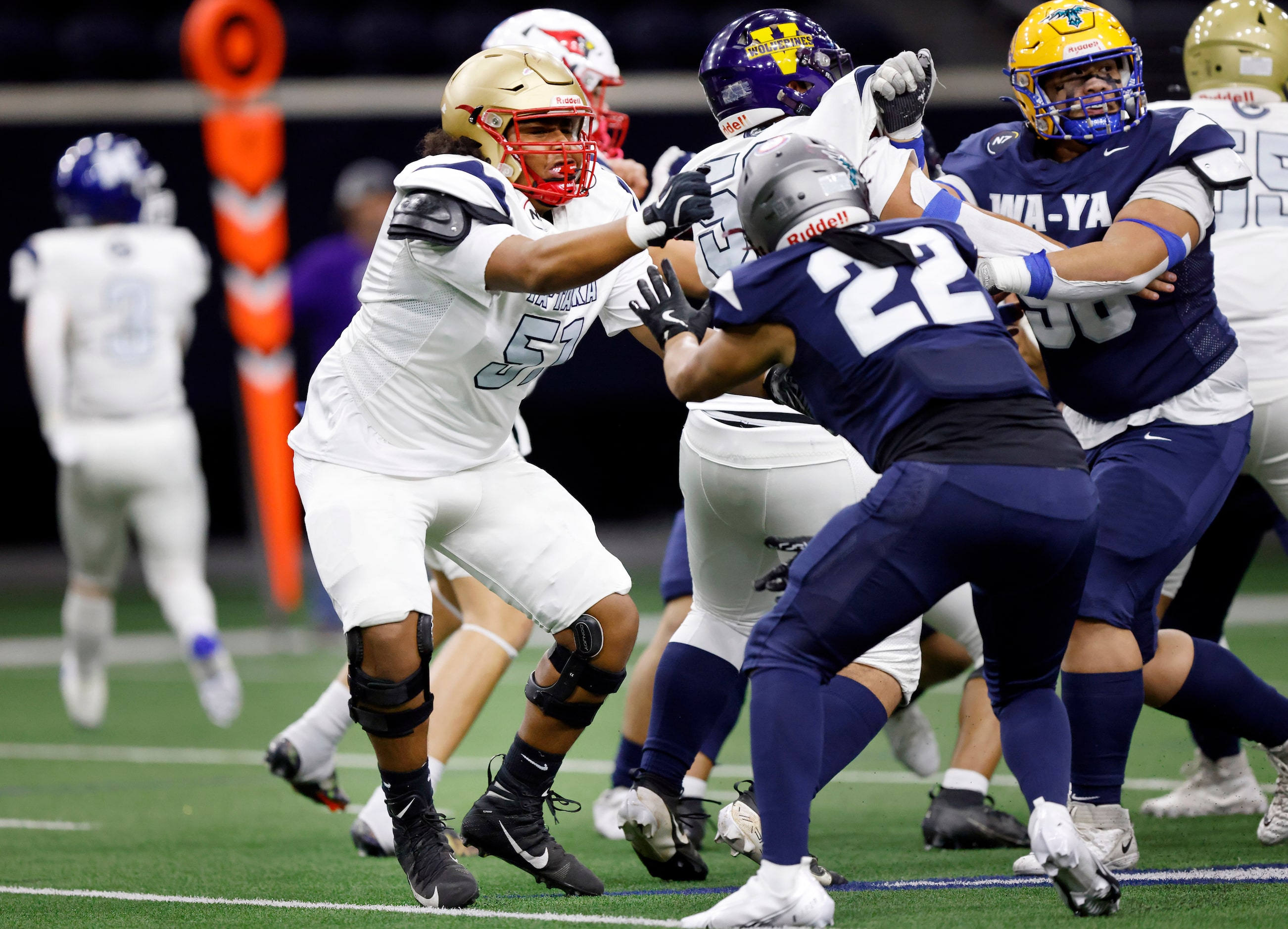 Ta’ Tanka offensive lineman Xavier Davis of South Grand Prairie High (TX) blocks Wa-Ya’s...