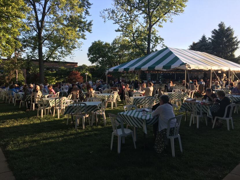 Dining outside Webster University's Loretto-Hilton Center for the Performing Arts in St....
