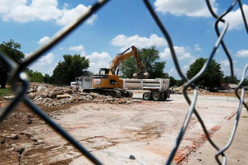 Demolition of several buildings continues at the River East project in the 2900 block of...