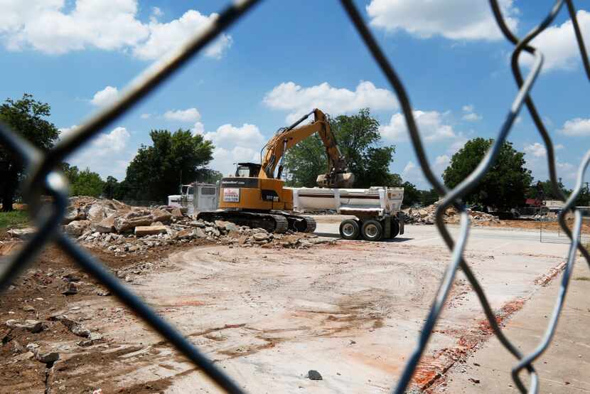Demolition of several buildings continues at the River East project in the 2900 block of...
