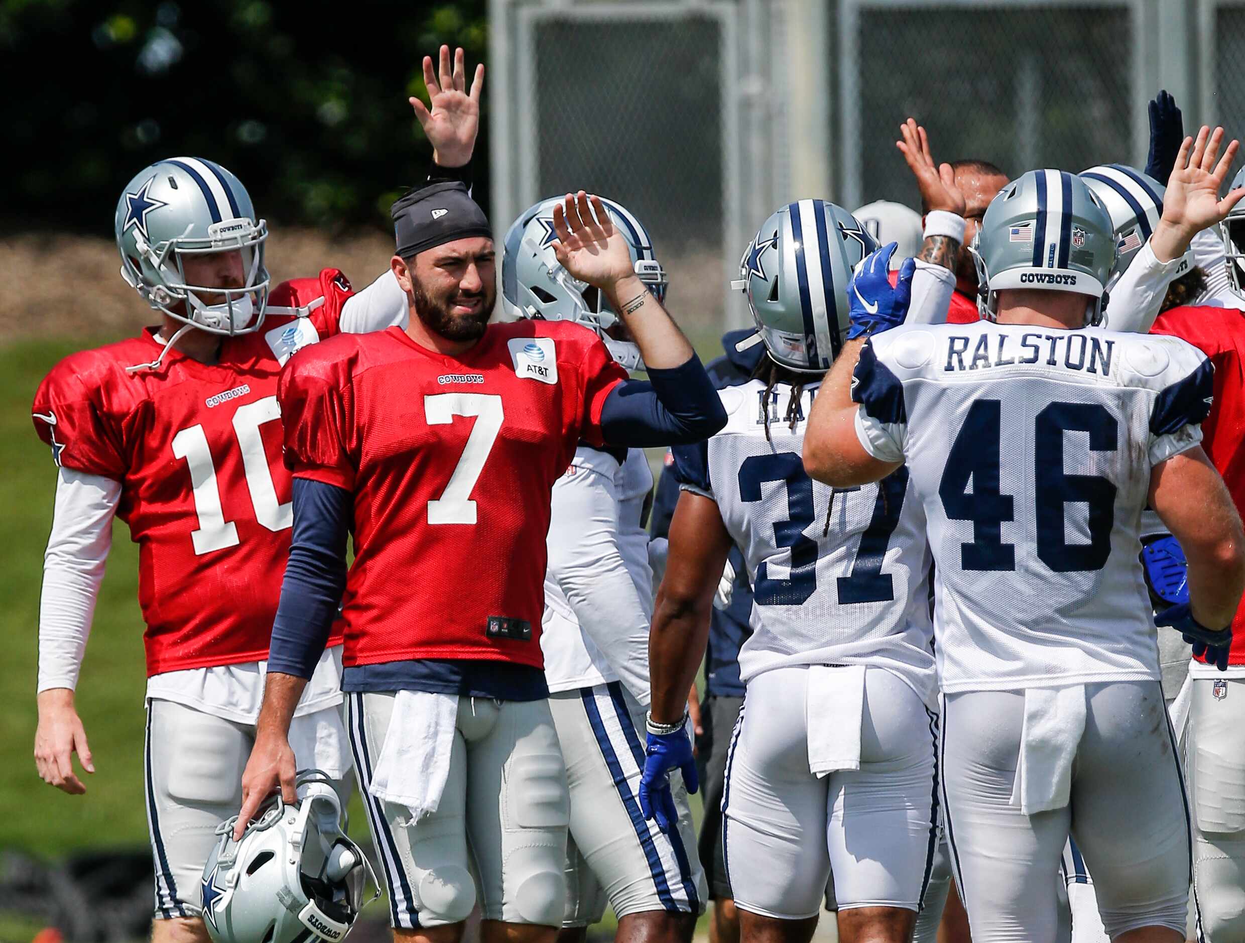 Dallas Cowboys quarterback Cooper Rush (10) and practice squad quarterback Ben DiNucci (7)...