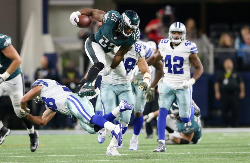 Philadelphia Eagles running back DeMarco Murray (29) leaps over Dallas Cowboys strong safety...