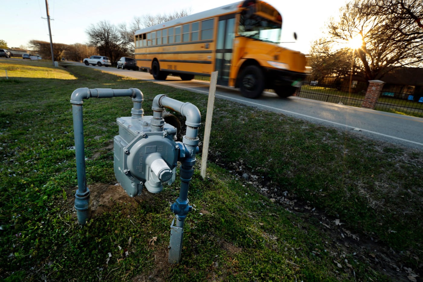 A school bus passes a gas meter on South Pearson Lane in Keller not far from where Michelle...