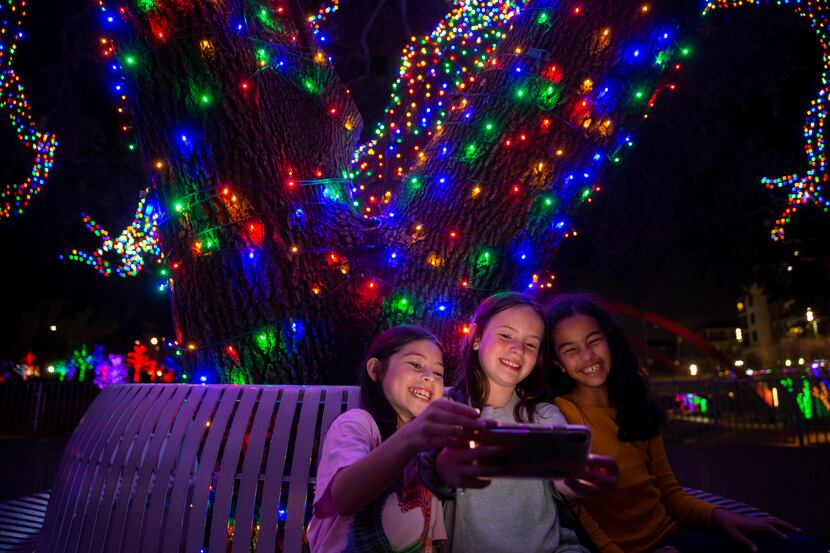 Friends take a selfie at Vitruvian Lights at Vitruvian Park.