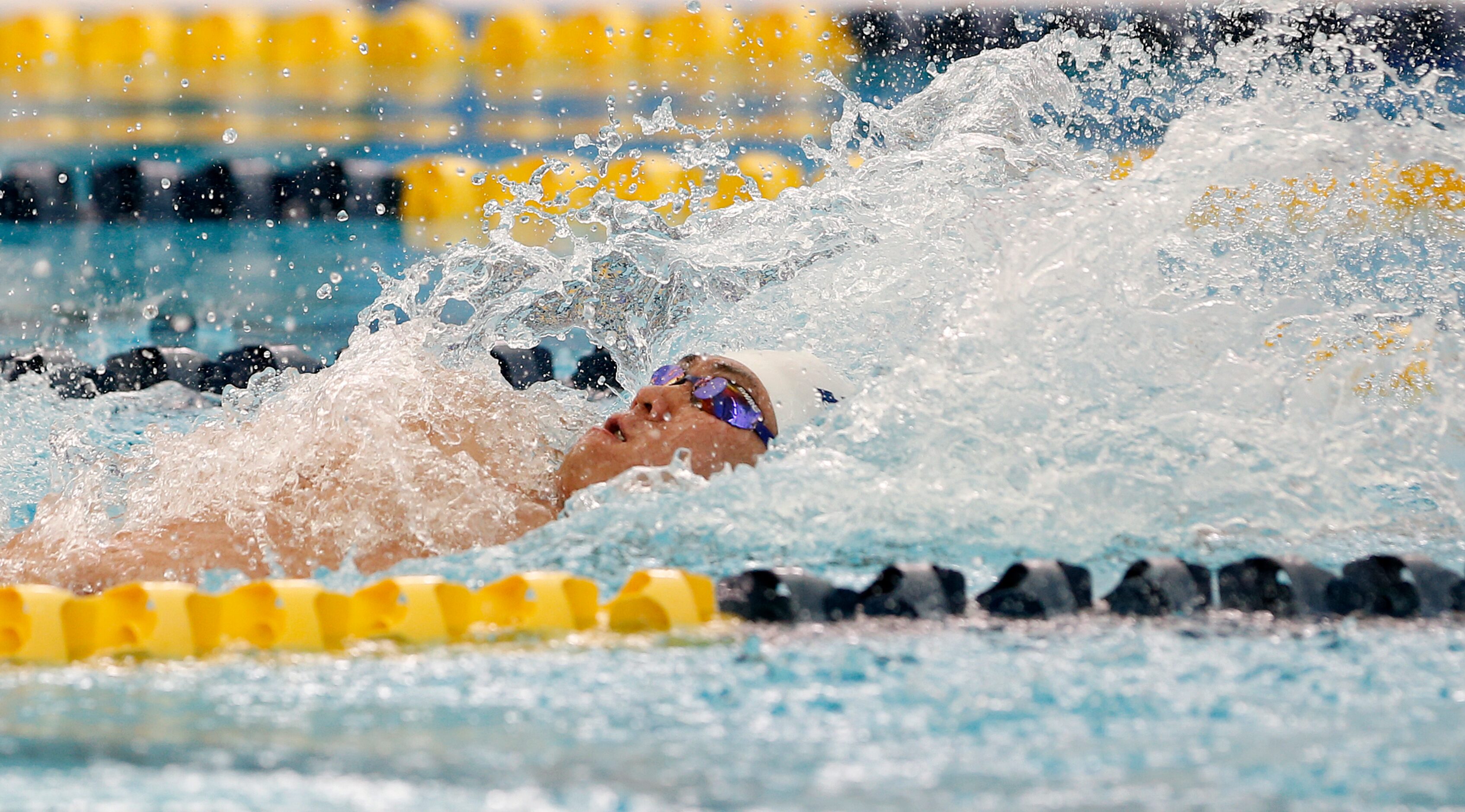 Keller Hugh Chang in back stroke for 200 yard Medley Relay. UIL boys 6A swim finals on...