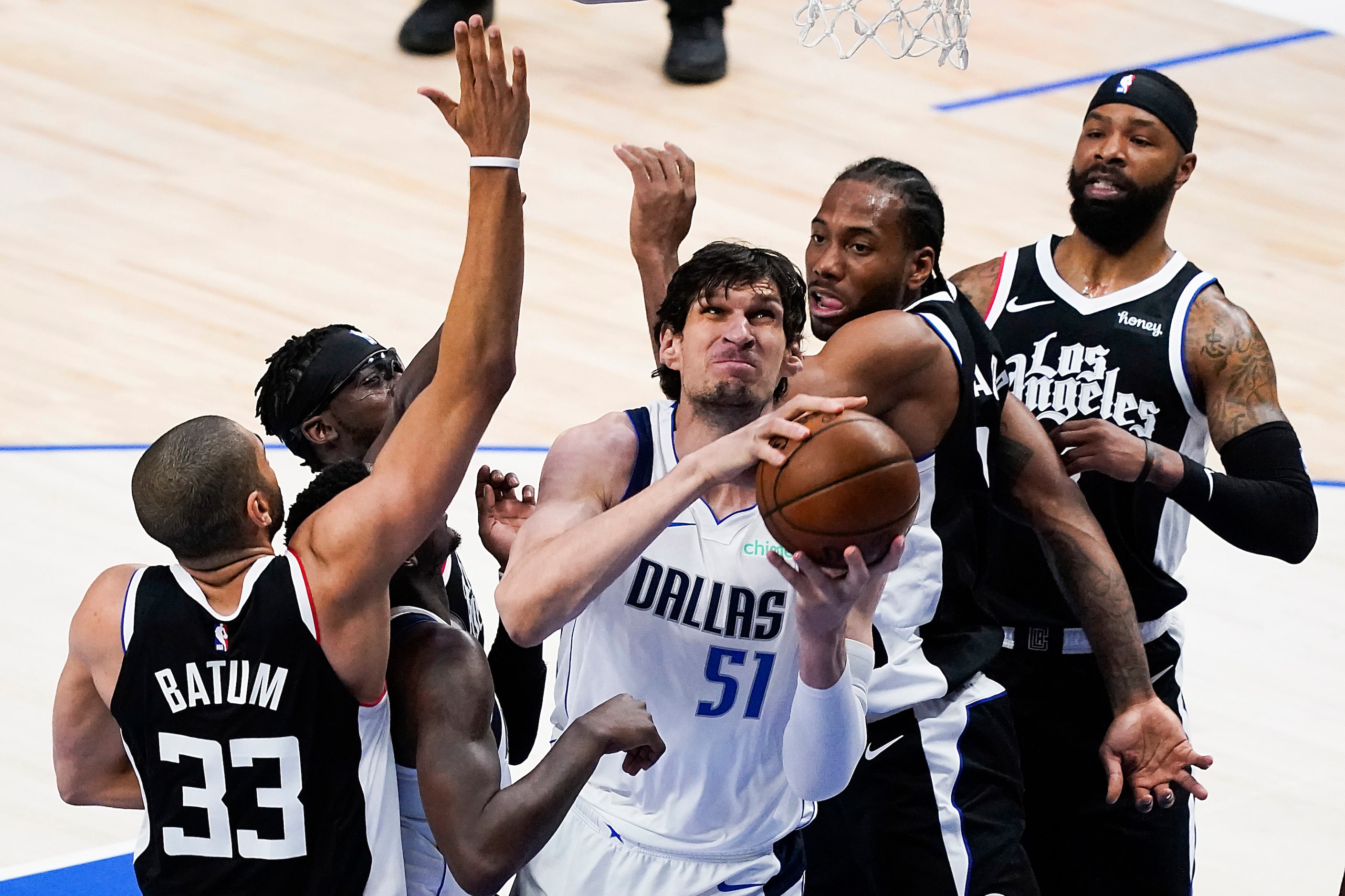 Dallas Mavericks center Boban Marjanovic (51) goes to the basket as LA Clippers forward...