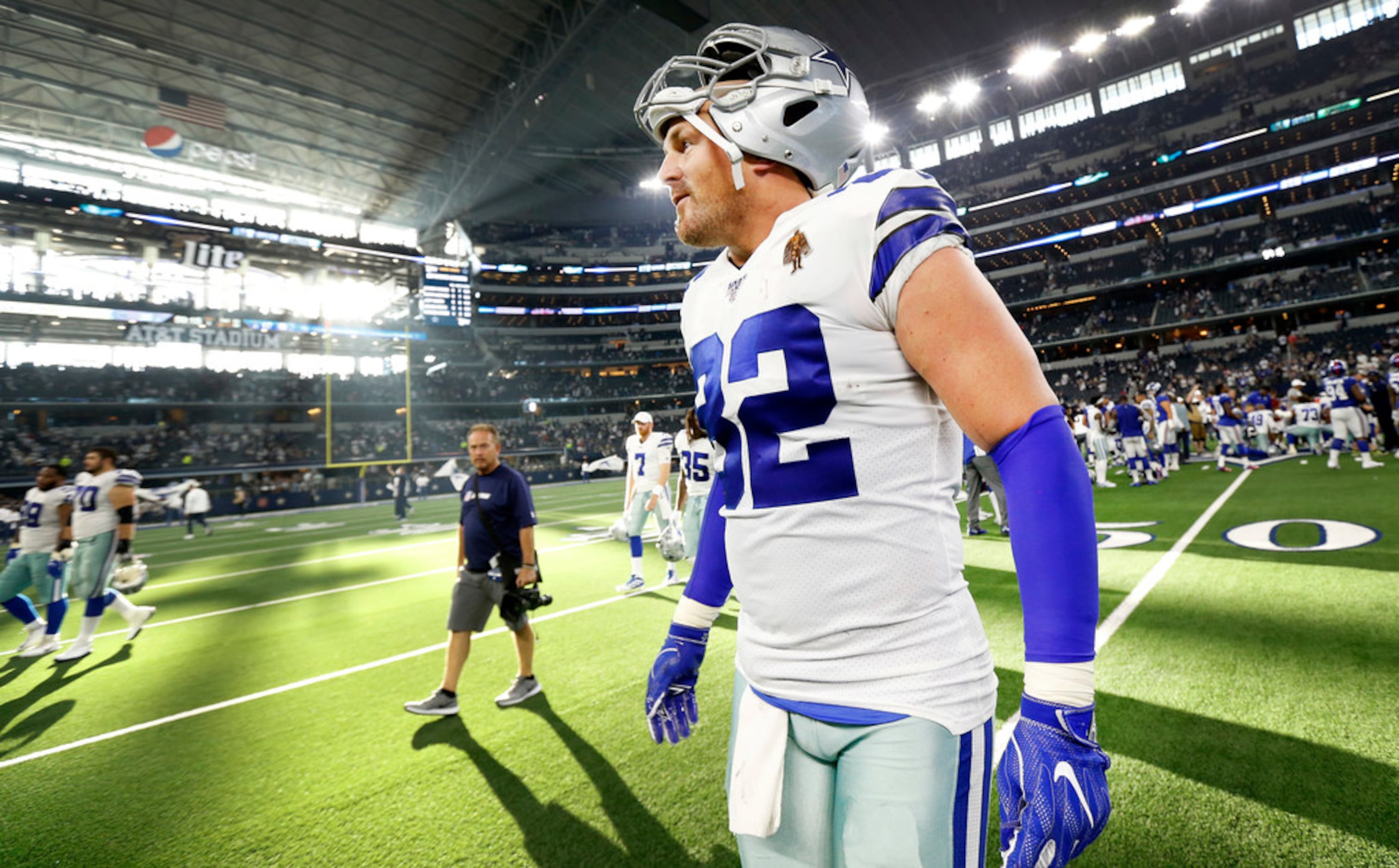 FILE – In this Oct. 10, 2019, file photo, Dallas Cowboys' Jason Witten (82)  warms up before an …