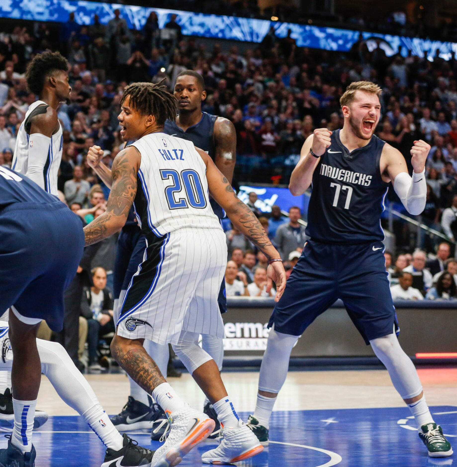 Dallas Mavericks guard Luka Doncic (77) celebrates a win over the Orlando Magic on...