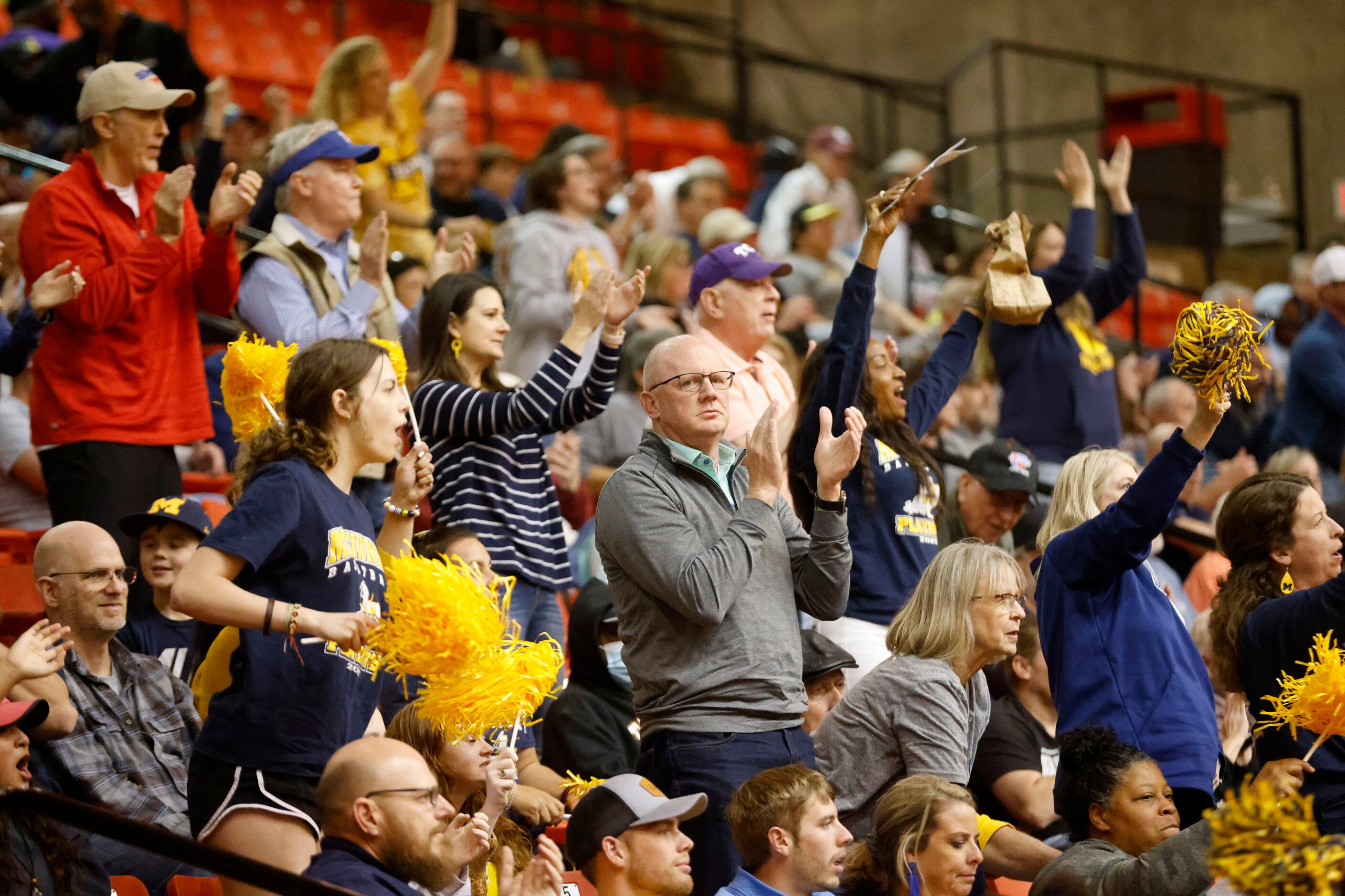 McKinney fans cheer as they played North Crowley during the first half of the Class 6A...