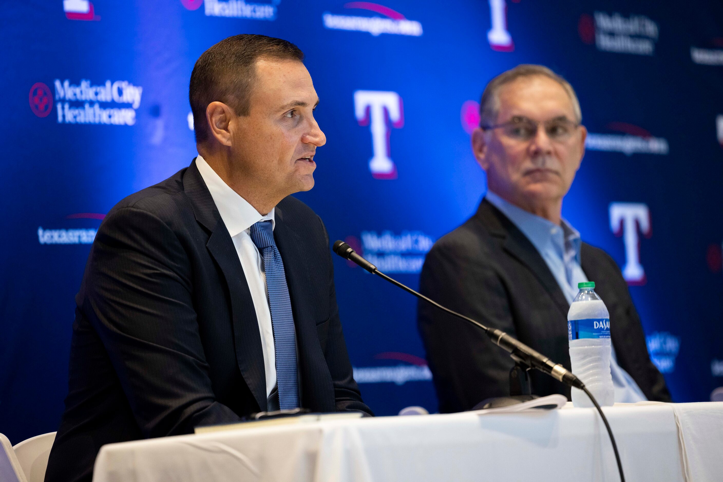 Chris Young (left), the team's executive vice president and general manager, speaks during a...