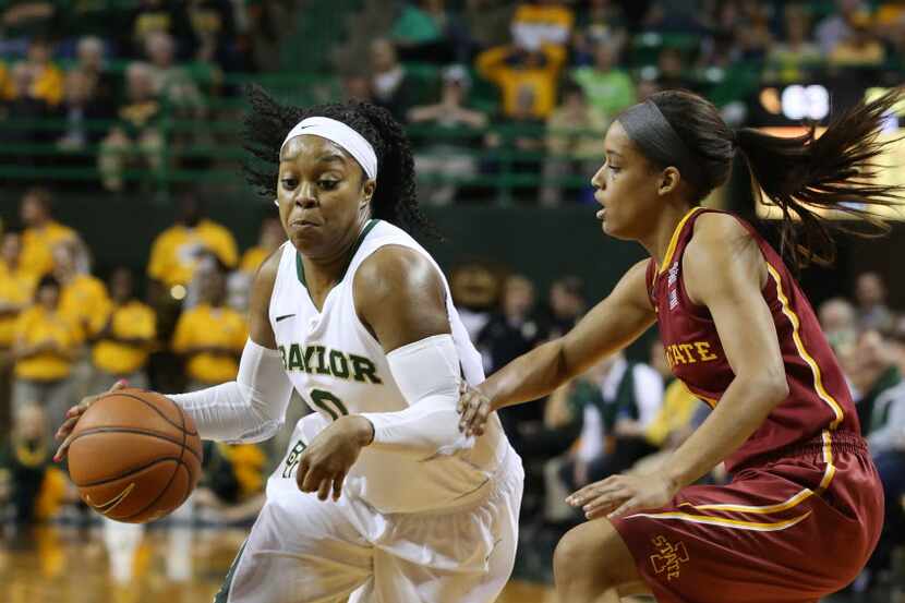 Baylor guard Odyssey Sims (0), left, drives past Iowa State guard Nikki Moody (4), right, in...