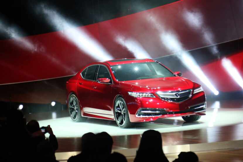 The 2015 Acura TLX is a muscular pre-production version of its midsize TLX sedan, which will...