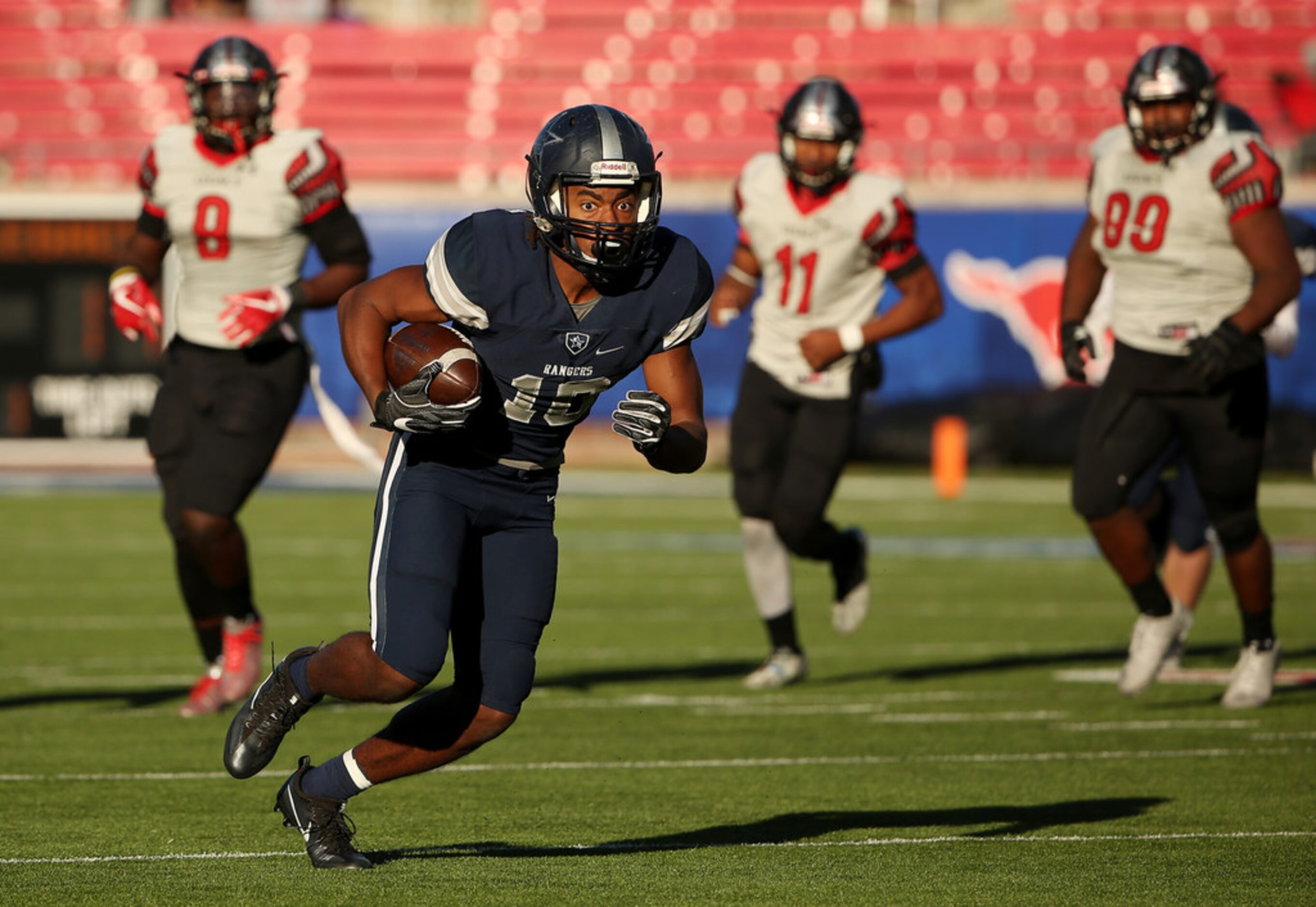 Frisco Lone Star wide receiver Kavika Pittman (10) runs for a 13-yard reception in the third...