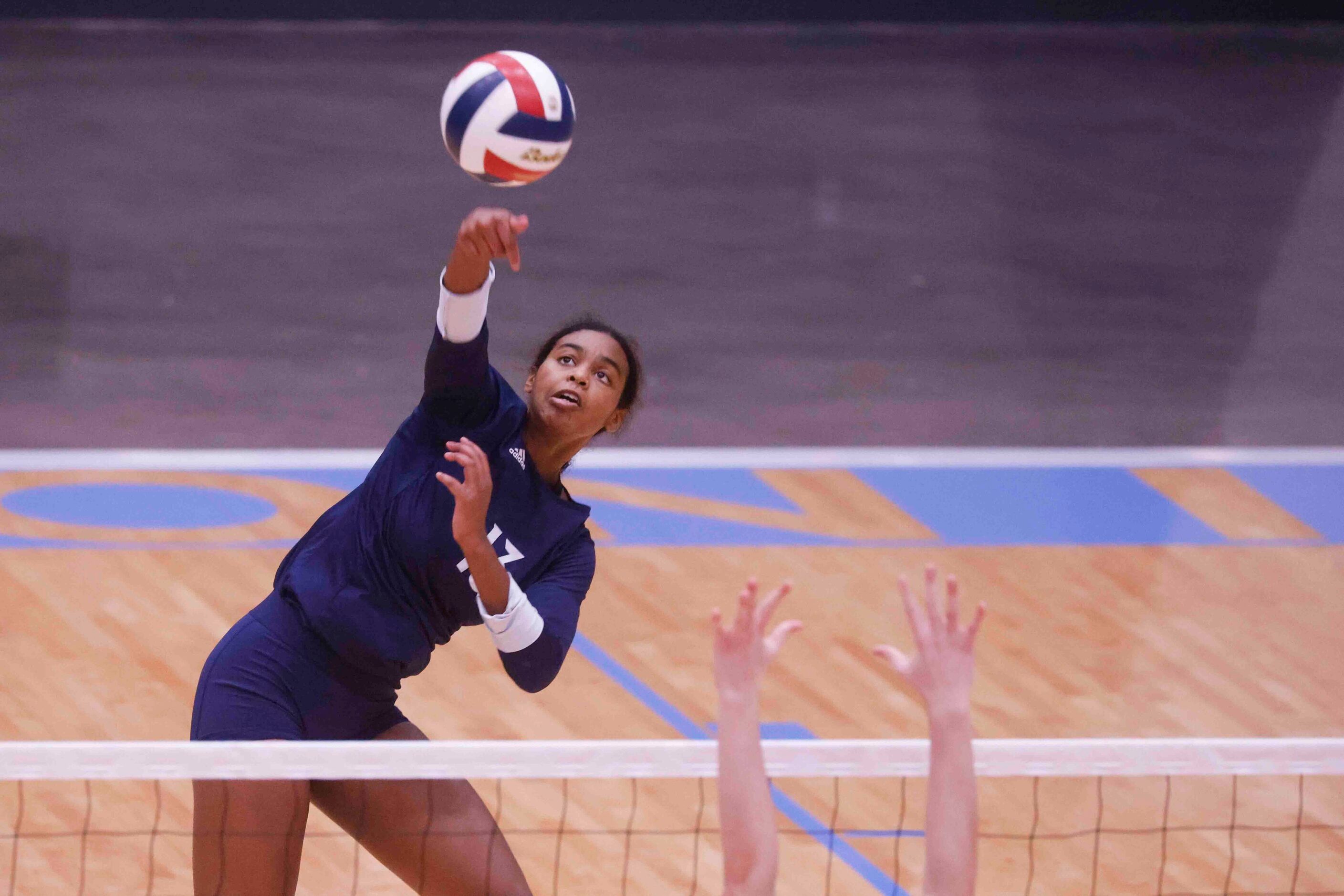 Flower Mound’s Brianna Watson (13) hits the ball against Highland Park High during a...