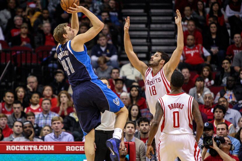 Dec 23, 2013; Houston, TX, USA; Dallas Mavericks power forward Dirk Nowitzki (41) shoots...