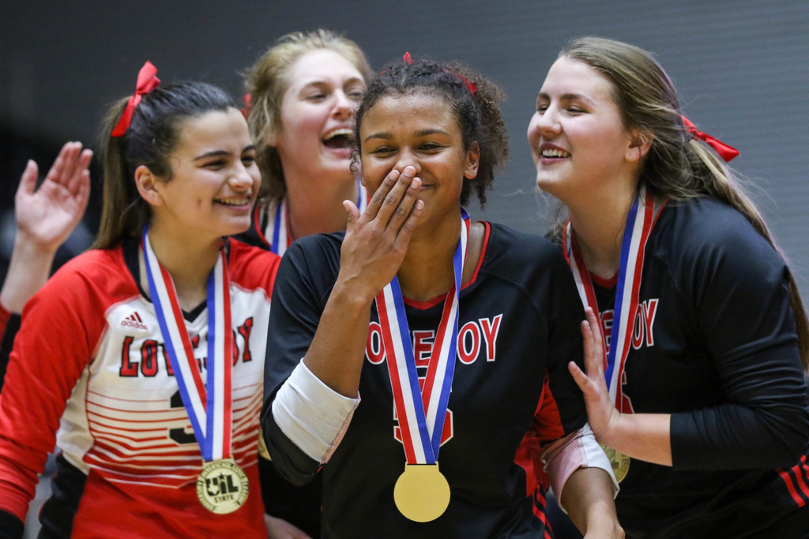 LovejoyÃs Cecily Bramschreiber  (5) (center) was named MVP after winning a class 5A...