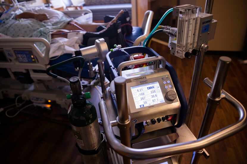 A patient uses an extracorporeal membrane oxygenation (ECMO) machine on Wednesday, Aug. 4,...