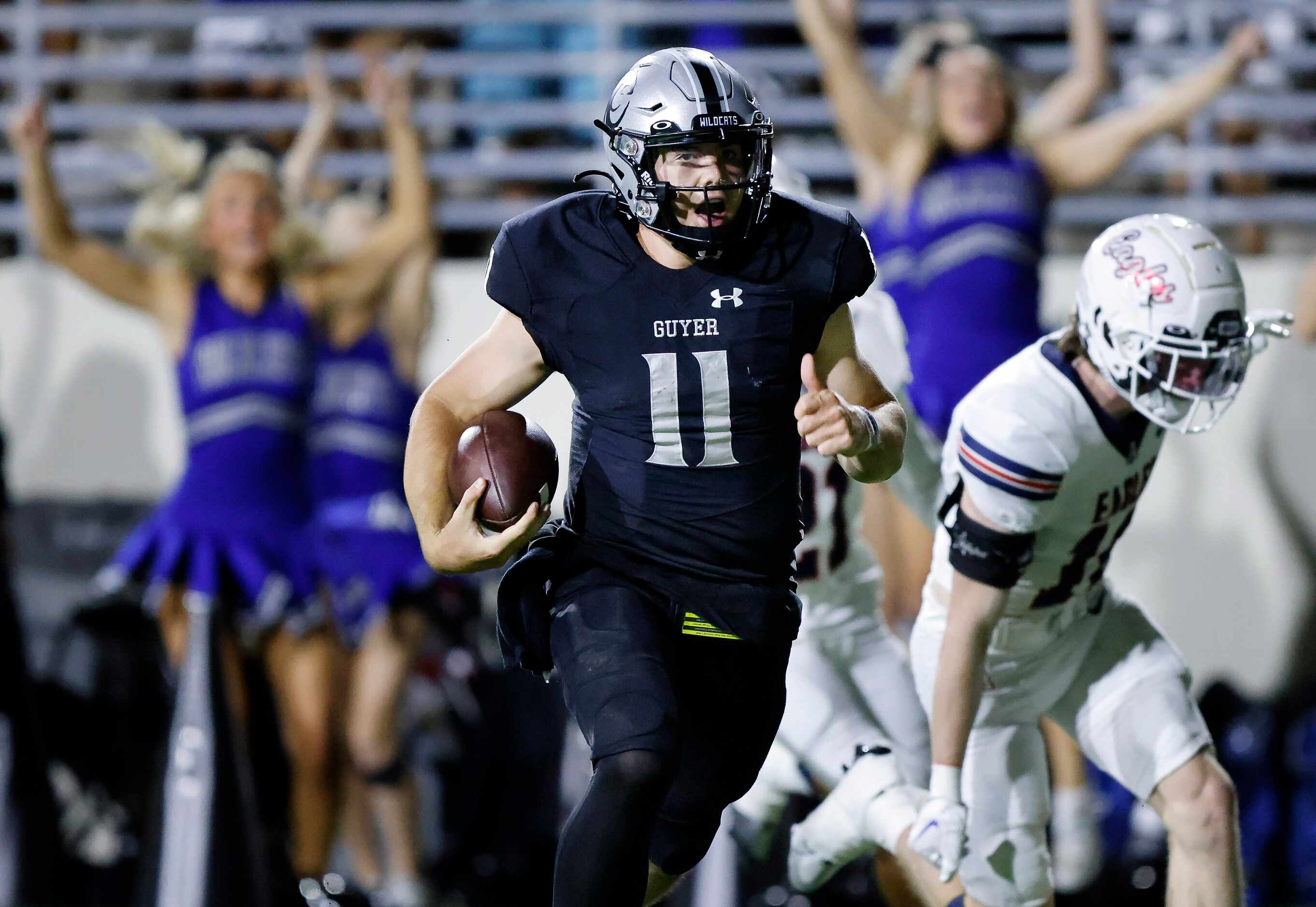 Denton Guyer quarterback Jackson Arnold (11) zig aged his way down the field running for a...