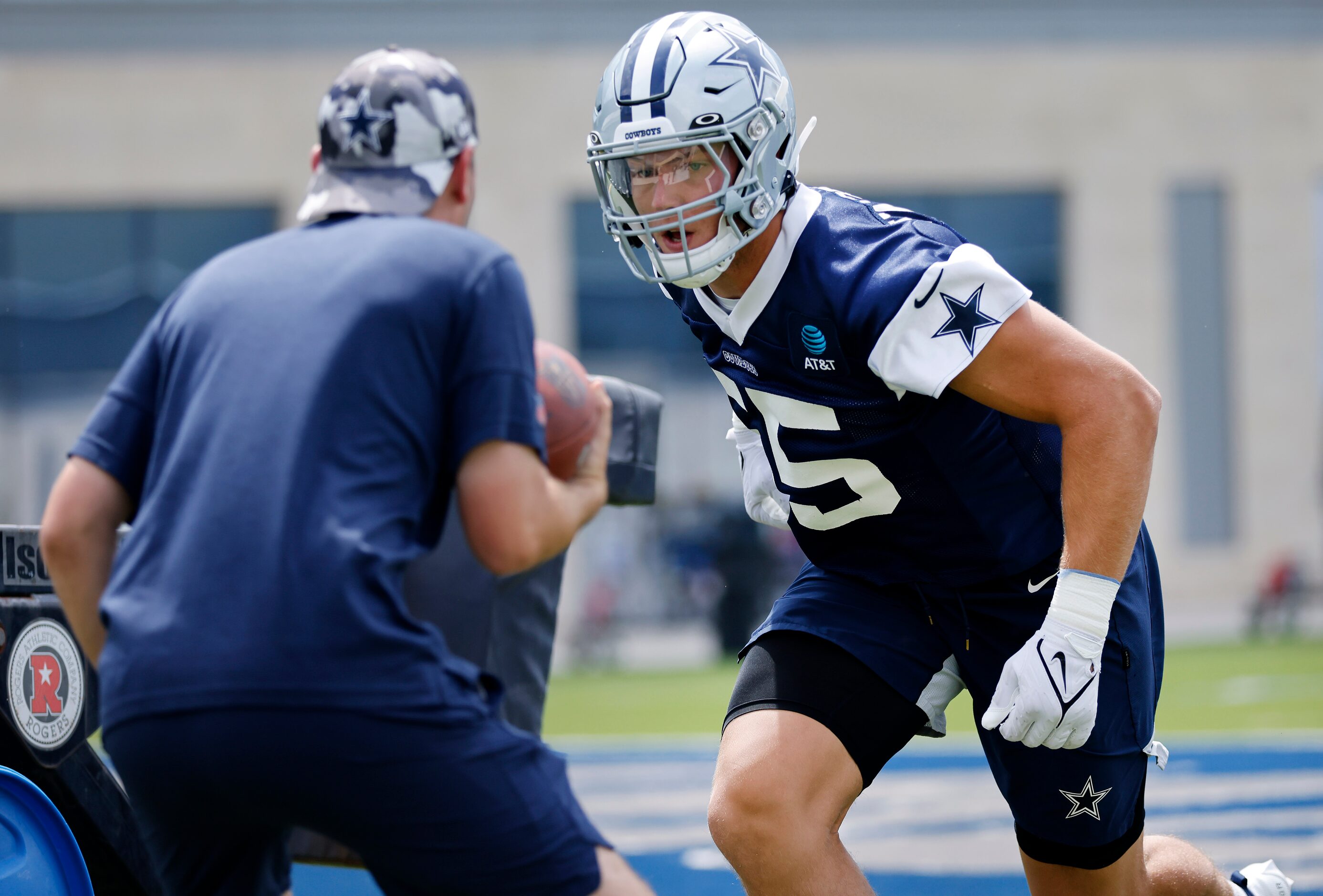 Dallas Cowboys linebacker Leighton Vander Esch (55) comes off the blocking sled during a...