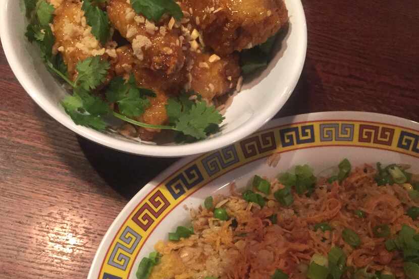 Here's a look at crab fat caramel wings, top, and combination fried rice, bottom, at Hot Joy...