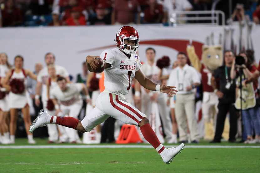 MIAMI, FL - DECEMBER 29:  Kyler Murray #1 of the Oklahoma Sooners runs the ball against the...