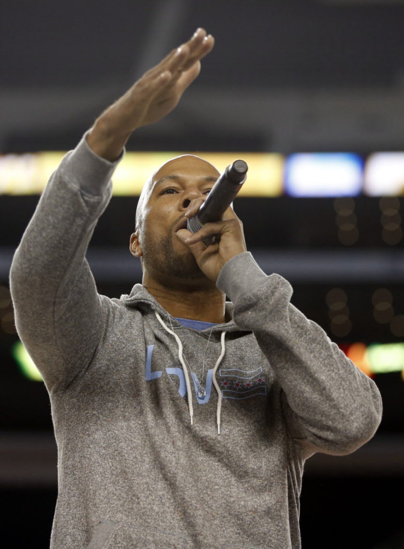 Common raps freestyle for the crowd during the Reese's Final Four Slant Celebration at AT&T...