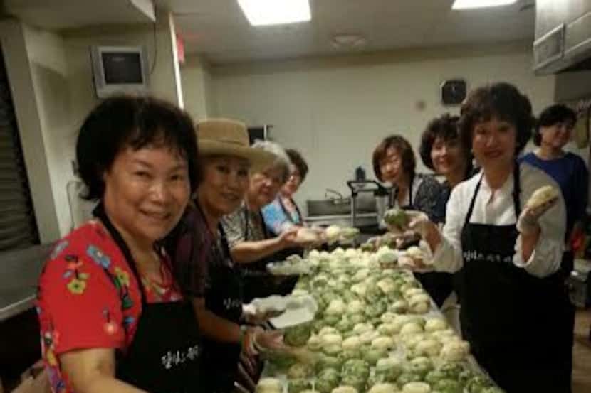 
Preparing homemade food for the Korean Festival on June 28 at New Song Church in Carrollton.
