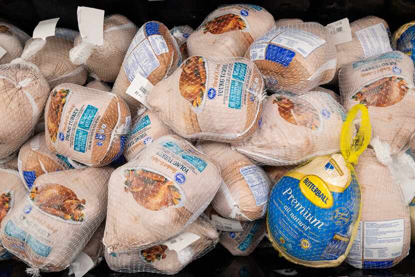 A refrigerated case of frozen turkeys photographed last Thanksgiving at Kroger on...