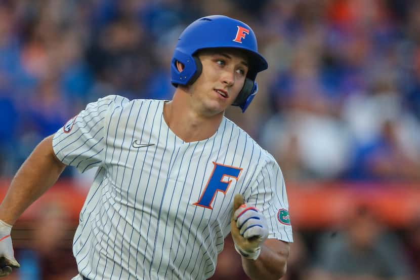 Florida outfielder Wyatt Langford (36) runs to first base during an NCAA regional...