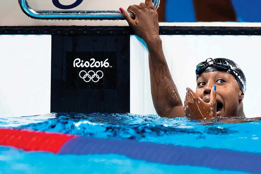U.S. swimmer Simone Manuel reacted after winning the gold medal in the women's 100-meter...