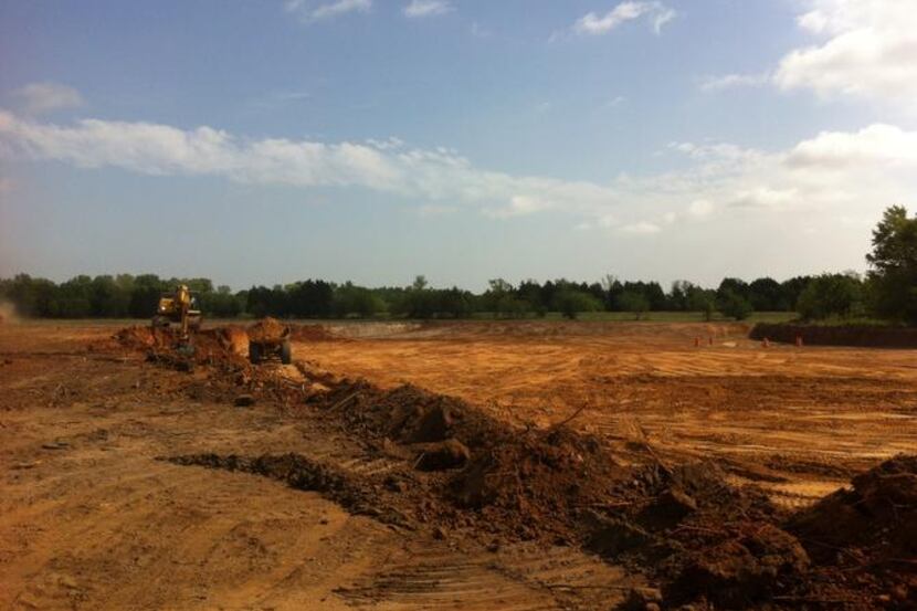 
A 20-acre, 20-foot-deep pit is being dug in the Great Trinity Forest for dirt to help build...