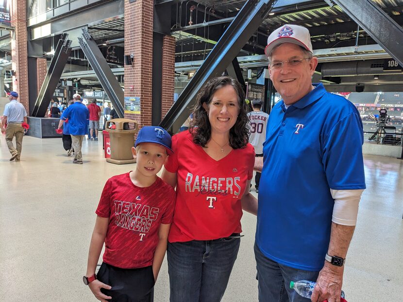 Jacob Billmeier, left, Julie Billmeier and Mike Seibold pose for a photo at Globe Life Field...