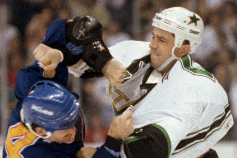 ORG XMIT: *S0407529543* 4-17-94 --- Dallas Stars #27 Shane Churla, right, gets physical with...