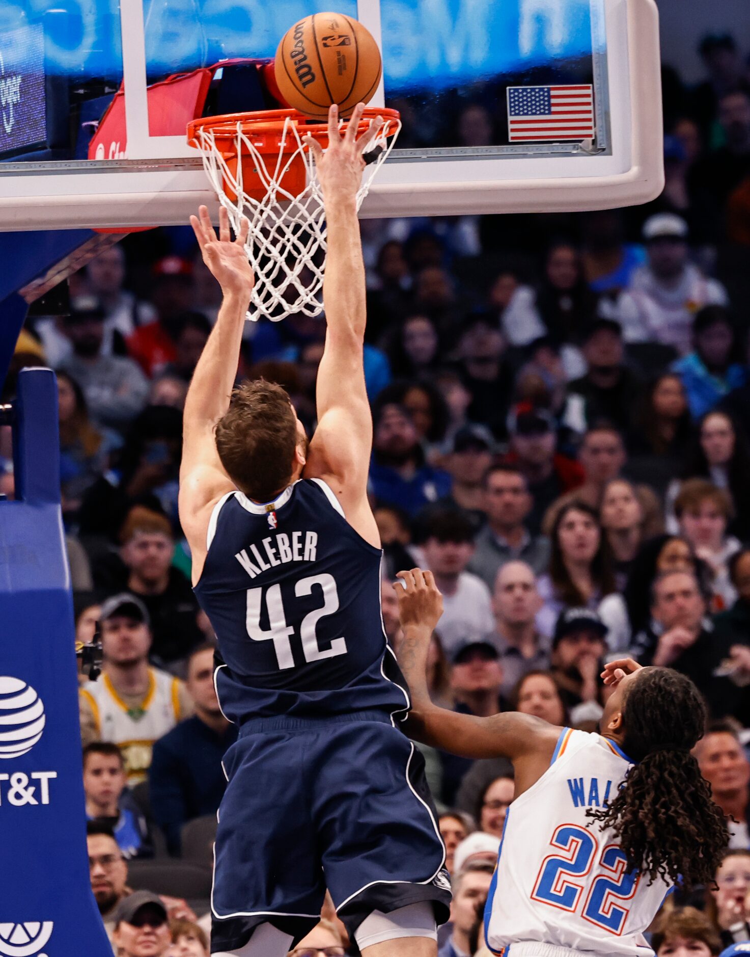 Dallas Mavericks forward Maxi Kleber (42) shoots a layup over Oklahoma City Thunder guard...