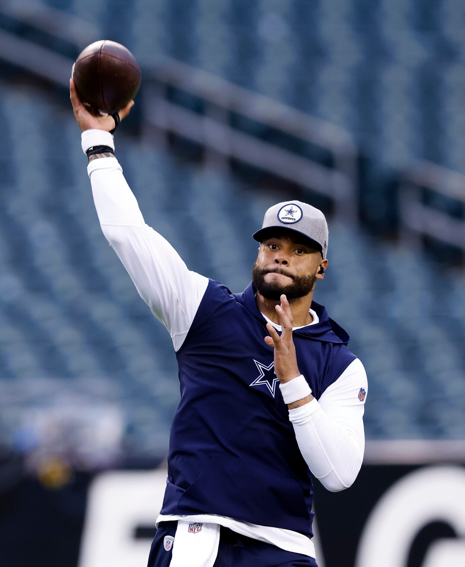 Dallas Cowboys quarterback Dak Prescott practices his throwing during pregame warmups at...