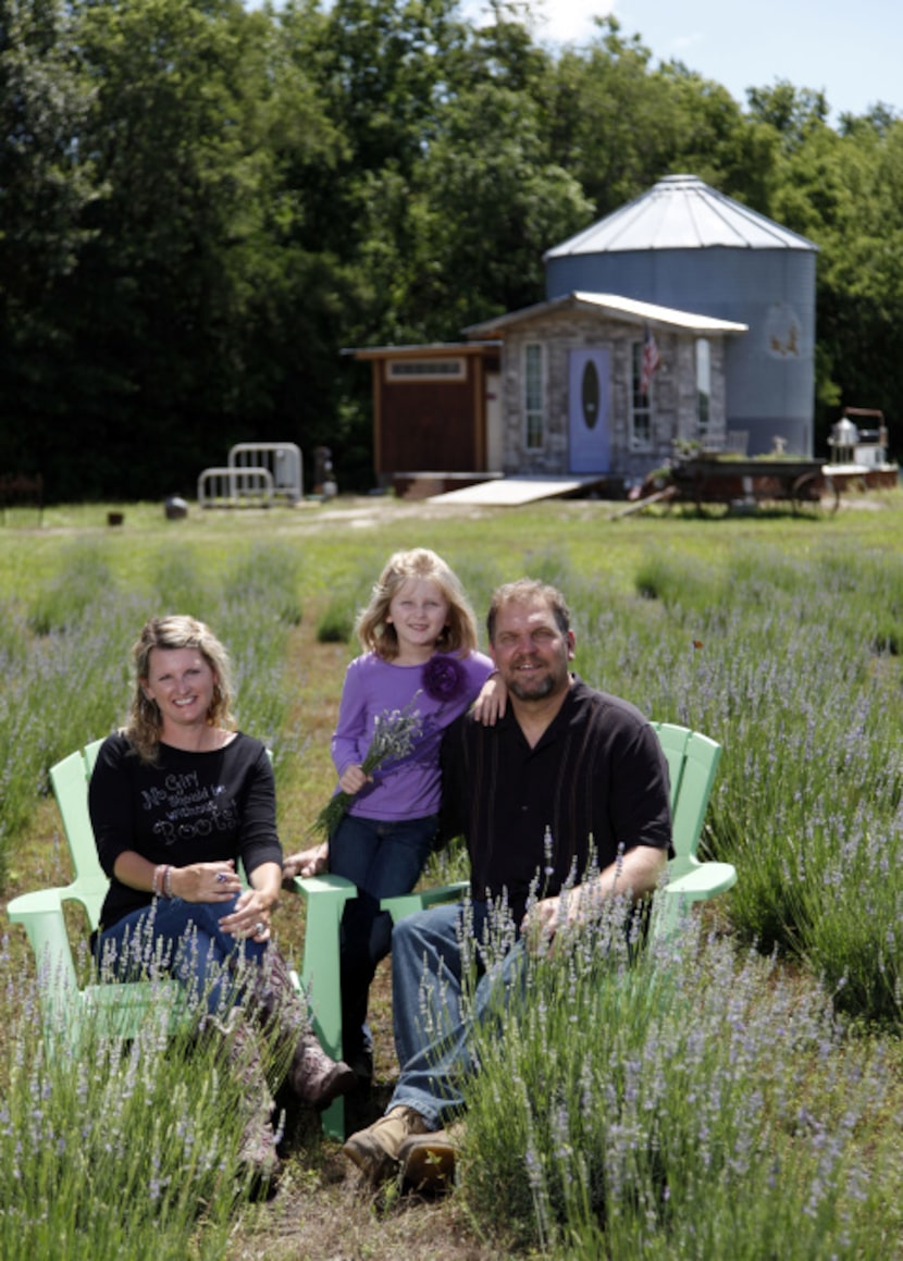 Owners Gwen and Mike Snyder and their daughter Savannah Snyder, for whom the farm is named,...