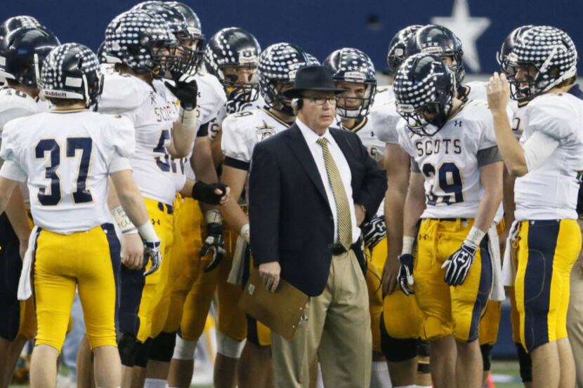 Highland Park head coach Randy Allen is pictured with his troops in the third quarter during...