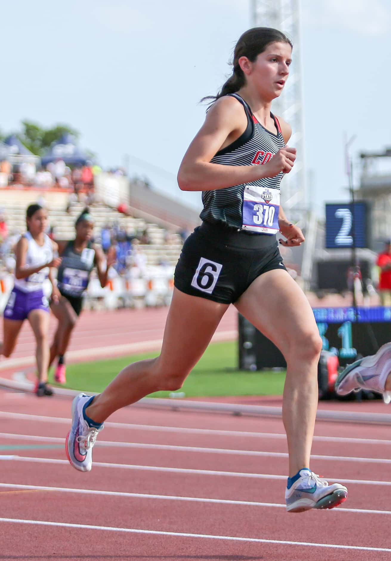 Coppell's Waverly Hassman competes in the 6A Girls 800 meter run during the UIL state track...
