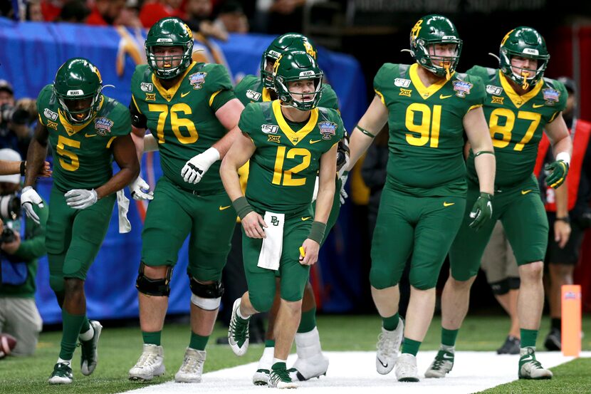 NEW ORLEANS, LOUISIANA - JANUARY 01: Charlie Brewer #12 of the Baylor Bears reacts with...