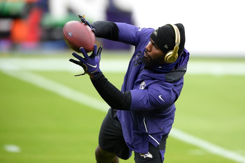 Baltimore Ravens wide receiver Dez Bryant works out prior to an NFL football game against...