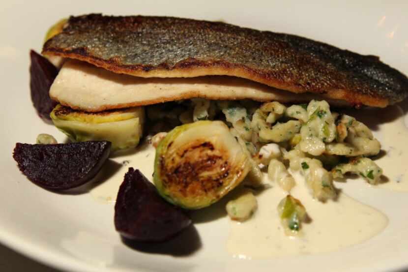 Pan-fried rainbow trout with pickled beets, herb spaetzle, brussel sprouts and...
