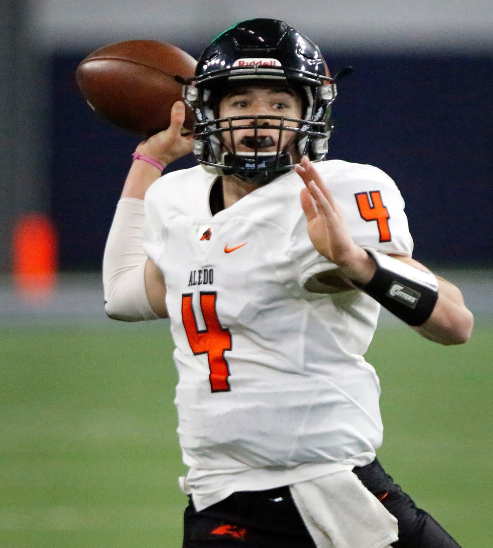 Aledo High School quarterback Jake Bishop (4) throws a pass during the first half as...