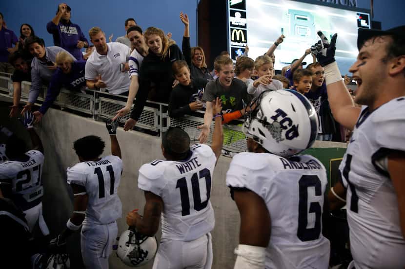 TCU Horned Frogs walk back to the locker rooms after a 62-22 win over Baylor Bears at McLane...