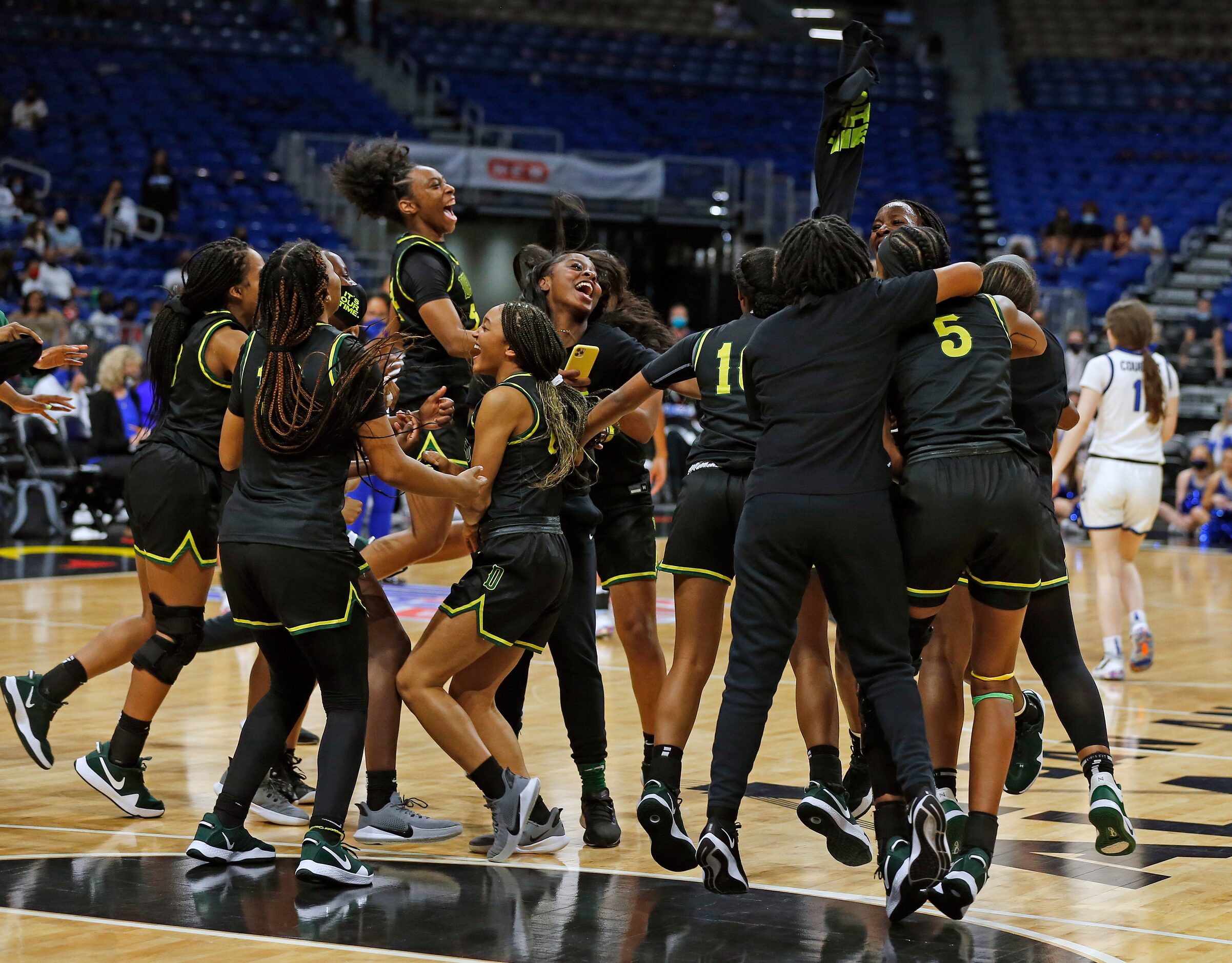 Desoto girls celebrate.DeSoto vs. Cypress Creek girls basketball Class 6A state championship...